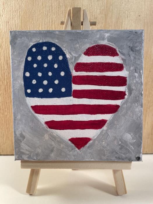 canvas painting of a heart with the American flag