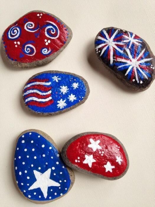 different rocks painted in red, white and blue