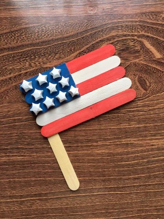 popsicle stick flag in red, white and blue with white stars